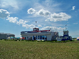 Аэродром Первушино. Главное здание. Вид с летного поля.